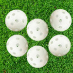 Air flight practice golf balls for backyard use.